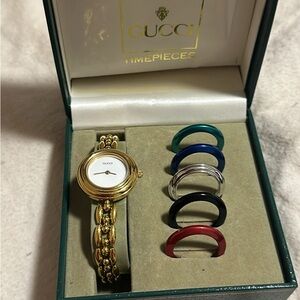 Gucci women’s bezel watch